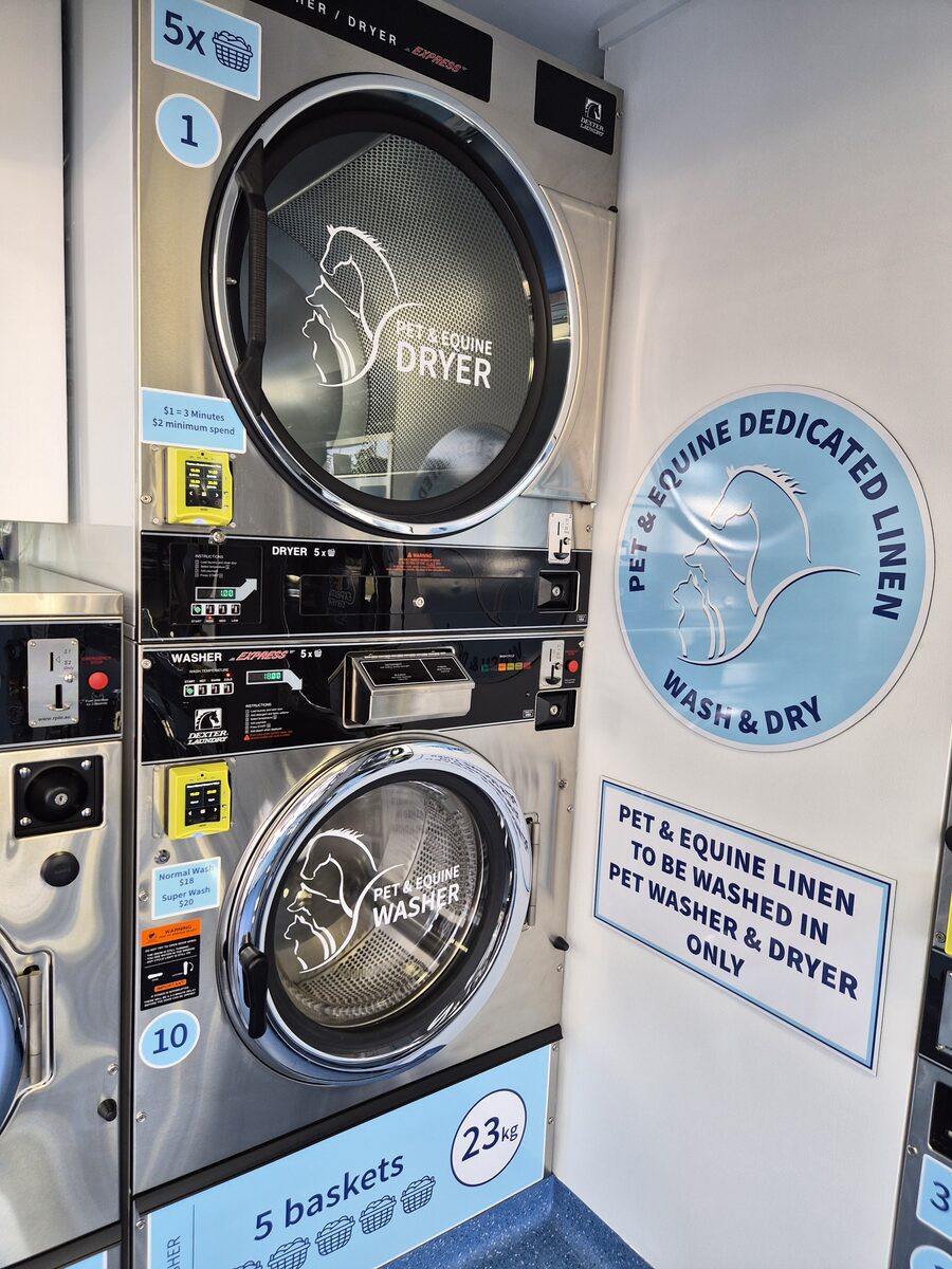 Dedicated pet and equine washer and dryer with 'dedicated linen' signage